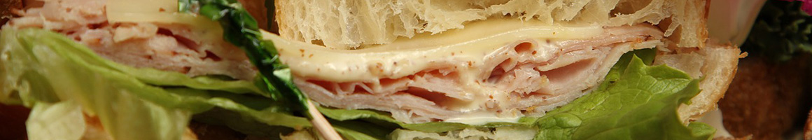 Eating Sandwich Seafood at Yorktown Pub restaurant in Yorktown, VA.